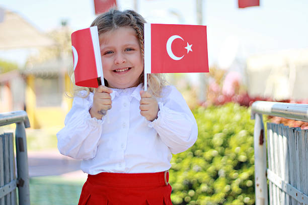 istock Girl carrying Turkish flag 2210577947