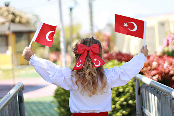 istock Girl carrying Turkish flag 2210577985