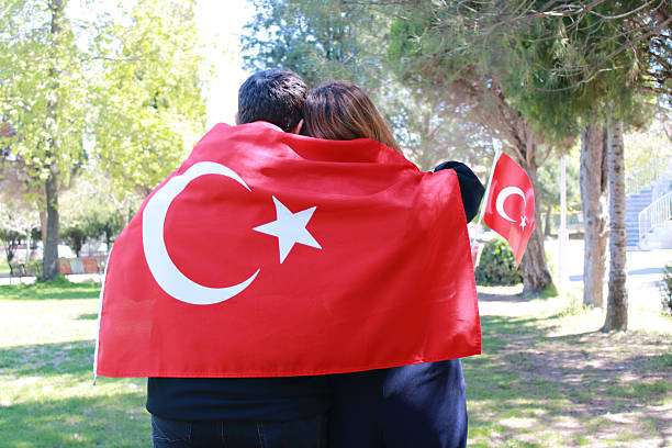 istock Couple wrapped in Turkish flag 2210578025