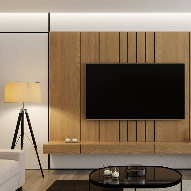 istock Modern Living Room with Wall-Mounted TV on Pine Textured Wall Paneling 2210579519