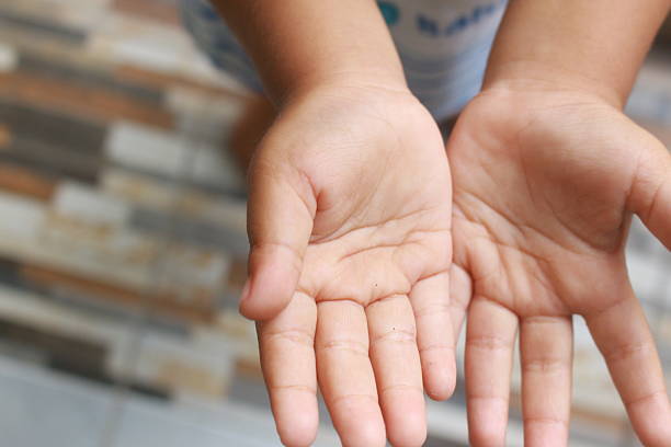 istock Little Child's Hand 2 2210589957