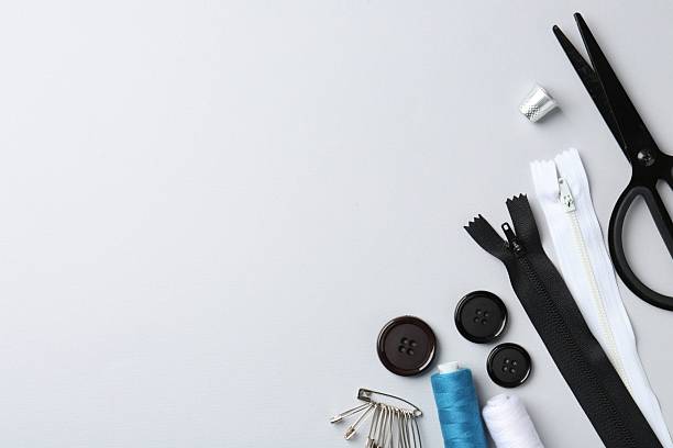 istock Different sewing supplies on white background, flat lay. Space for text 2210590158
