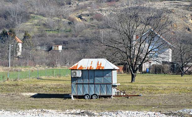 istock a small metal shed in a field 2210591228