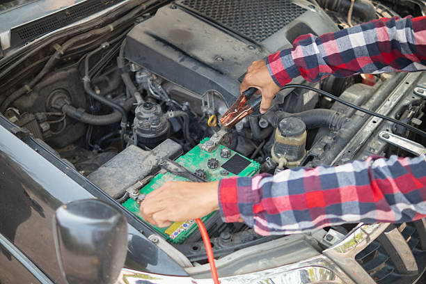 istock car service center mechanics are checking condition car and engine make sure they are ready use and in perfect condition according center warranty. periodic vehicle inspections for safety in driving. 2210591405