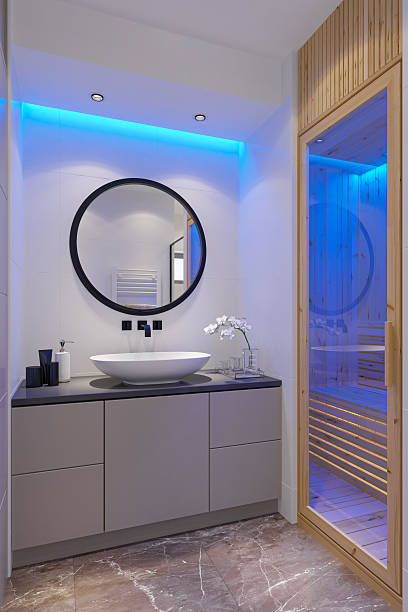 istock Modern Home Spa Bathroom with Finnish Pine Sauna and Blue Accent Lighting 2210591624