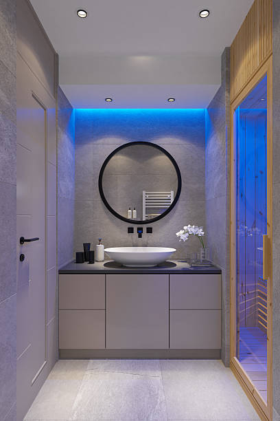 istock Modern Home Spa Bathroom with Finnish Pine Sauna and Blue Accent Lighting 2210591963