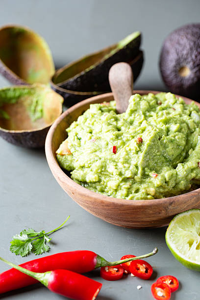 istock Spicy guacamole with chili and lime 2210597087