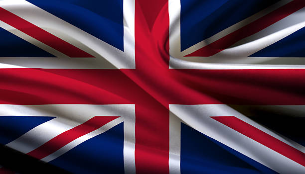 istock United Kingdom national flag on wavy background 2210598774