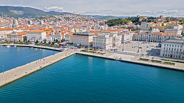 Aerial view of Trieste, including famous Piazza Unita, City Hall, numerous churches and palaces