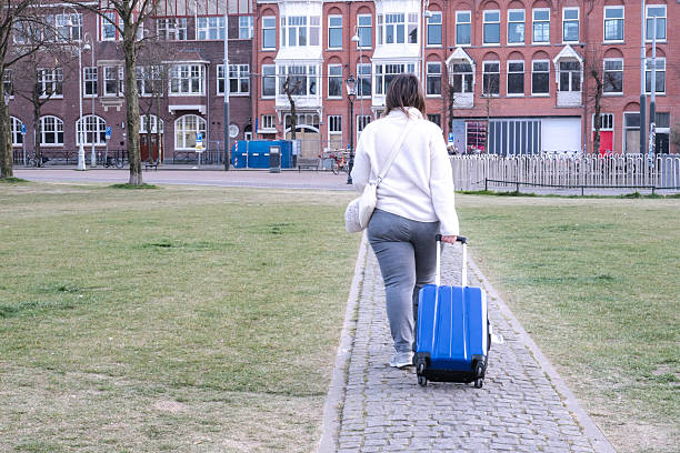 istock Middle-Aged Woman Exploring Amsterdam in Spring – Solo Travel 2210606845