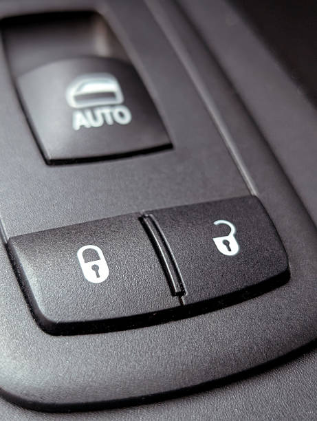 istock car lock unlock buttons on the door panel 2210612172