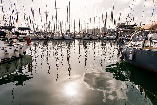 Barcelona Port Vell marina boats and maremagnum in a summer sunny day at Catalonia of Spain