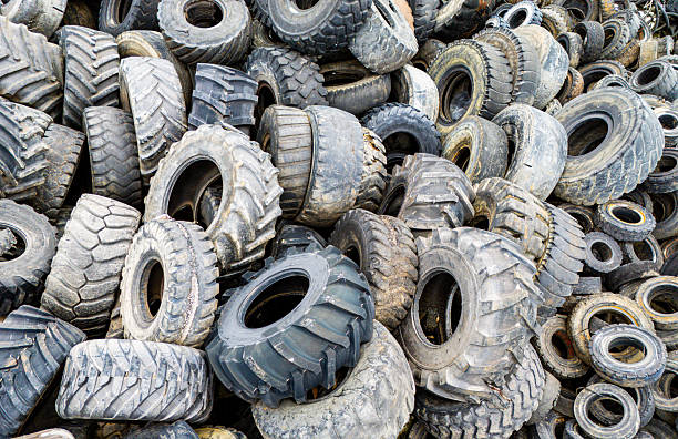 istock Tire Graveyard, Waste Tires Ready for Recycling 2210624737