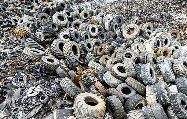 istock Tire Graveyard, Waste Tires Ready for Recycling 2210624747