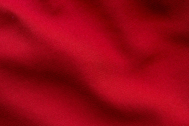 istock beautiful red fabric texture and background. luxury red fabric close up 2210626981