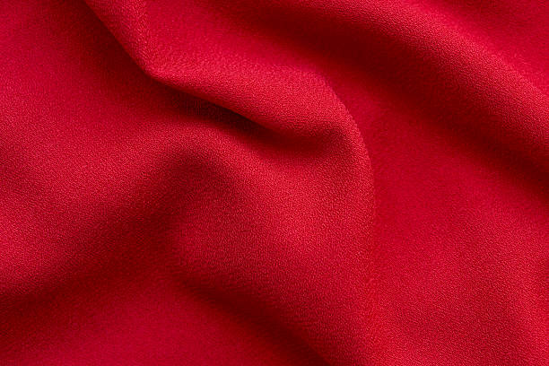 istock beautiful red fabric texture and background. luxury red fabric close up 2210627006