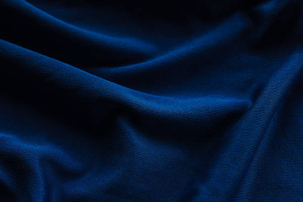 istock texture and background of dark blue fabric beautiful close up. wrinkled pattern on dark blue fabric 2210627452