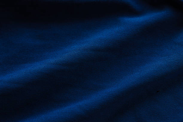 istock texture and background of dark blue fabric beautiful close up. wrinkled pattern on dark blue fabric 2210627455