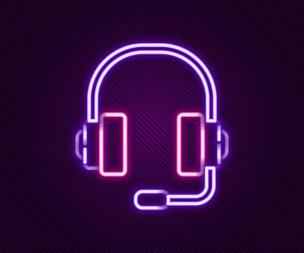 istock Glowing neon line Headphones icon isolated on black background. Support customer service, hotline, call center, faq, maintenance. Colorful outline concept. Vector 2210629949