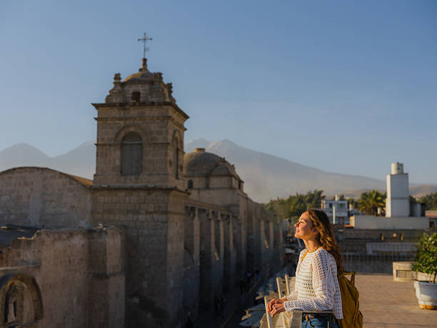 Woman exploring colonial architecture during experiential trip to  Arequipa, Peru