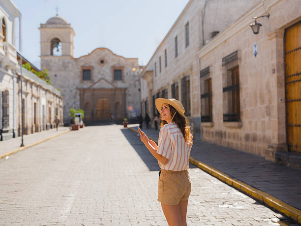 istock Woman using smartphone during traveling in Peru 2210631065