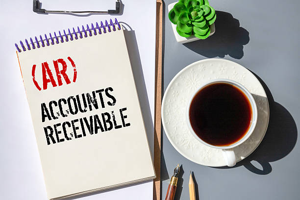 istock AR - Accounts Receivable acronym with calculator 2210631979