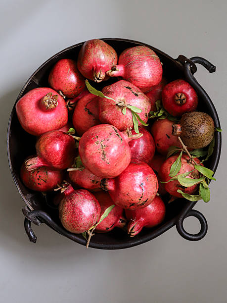 istock A bowl of ripe pomegranates 2210639653