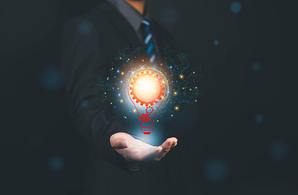 istock Light Bulb's bright creative idea is completely connected to business with an art background. Lamp light has hands and digital concept. 2210645922