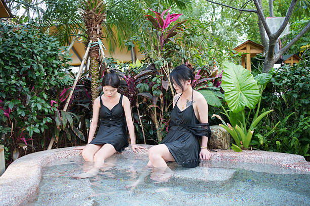 Young Asians enjoying the hot spring
