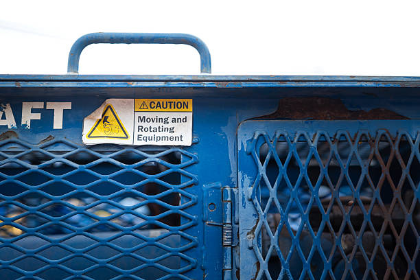 istock Caution safety sign of moving part inside the machine. 2210651419
