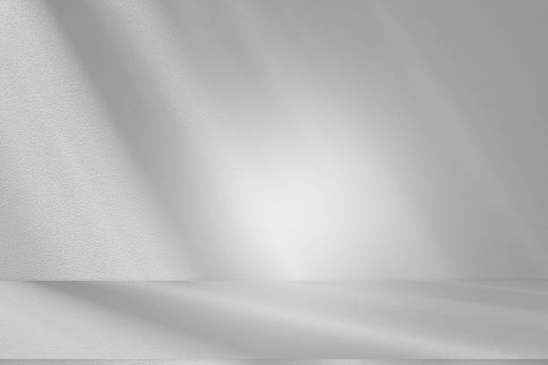 Wall interior background, studio and backdrops show products.with shadow from window color white . background for text insertion and presentation product