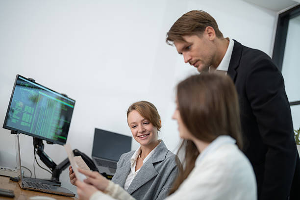 istock Team collaboration in a modern office environment during a project meeting with professionals discussing strategies 2210653125