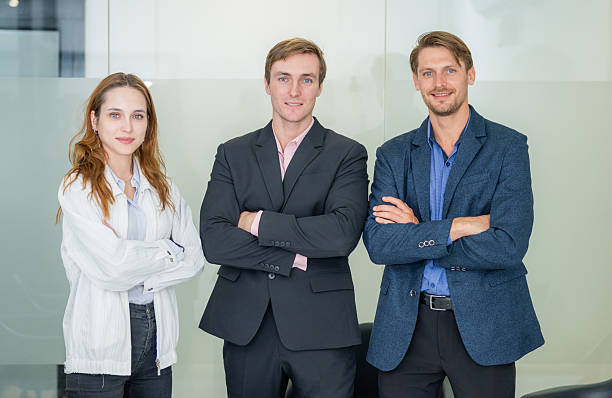 istock Business professionals collaborate in a modern office setting during a team meeting to discuss project strategies and goals 2210659102