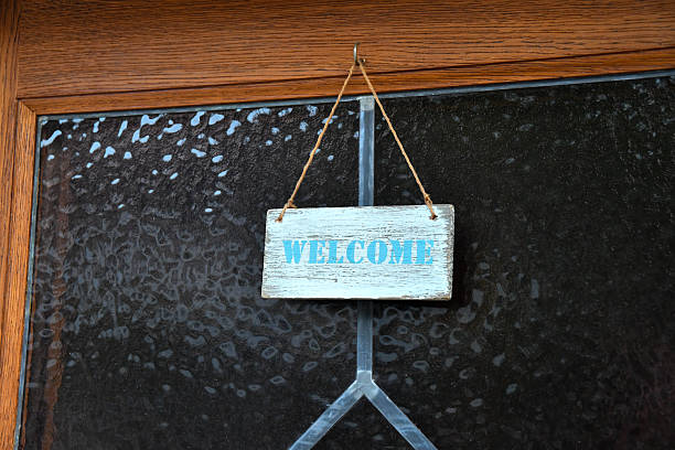 Welcome Sign on Textured Glass Door