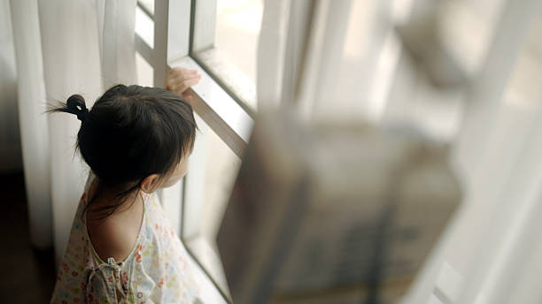istock Young Asian girl is sick in bed 2210663249