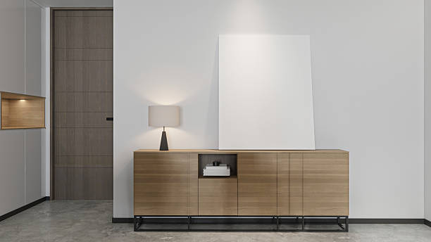 istock Modern Entryway with Wooden Sideboard, Lamp, and Blank Canvas 2210664653
