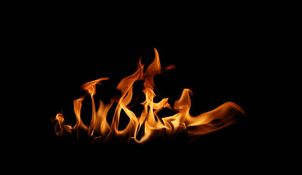 istock Black background fire, flames with torches and textures with splitting power effect, can grill red, burning with burning smoke and sparks in barbecue grill fire 2210665493