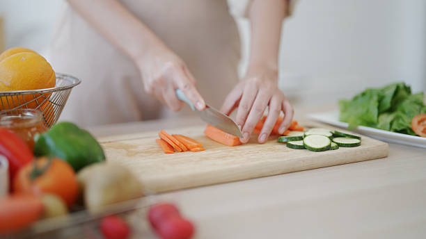 istock Prepare a salad in the kitchen. 2210665603