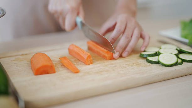 istock Prepare a salad in the kitchen. 2210665613