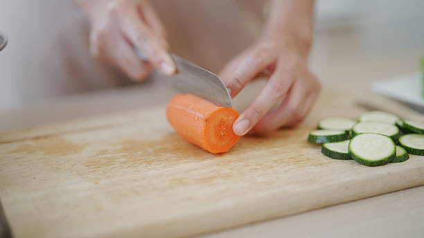 istock Prepare a salad in the kitchen. 2210665628