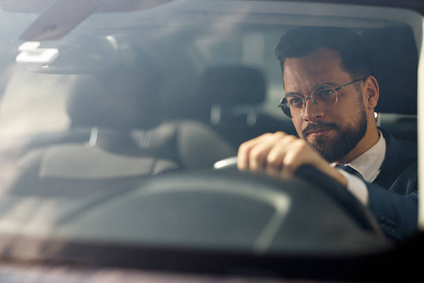 istock Businessman Driving Car 2210668203