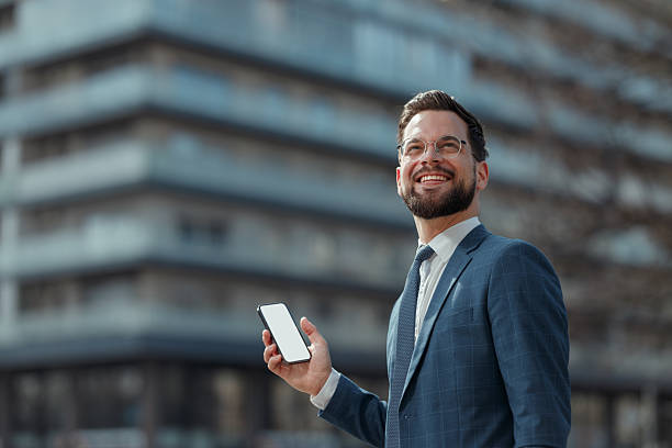 Businessman Showing Smartphone Screen