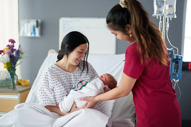istock Women Supporting Women in Childbirth 2210668448