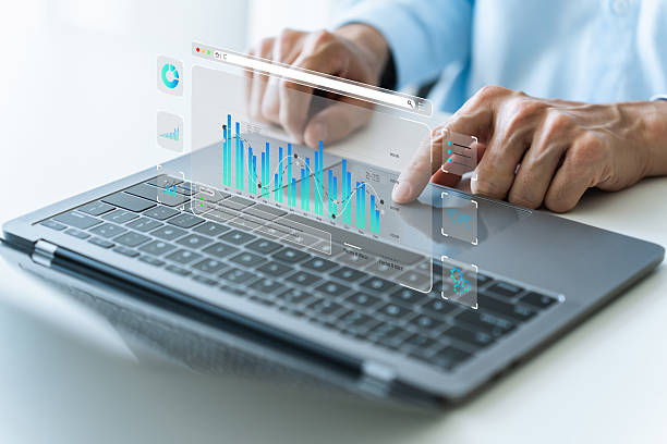 istock Businessperson using laptop for corporate business information strategy planning and database management analysis. Marketing customer data research and survey, intelligence platform technology 2210668760