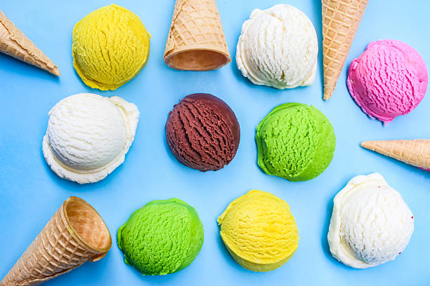 istock colorful ice cream cone scoop on blue background 2210671180