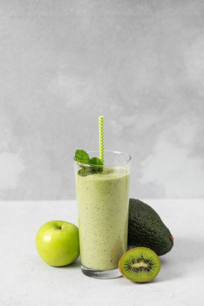 istock Refreshing avocado kiwi smoothie with apple and mint for a nutritious breakfast 2210675603
