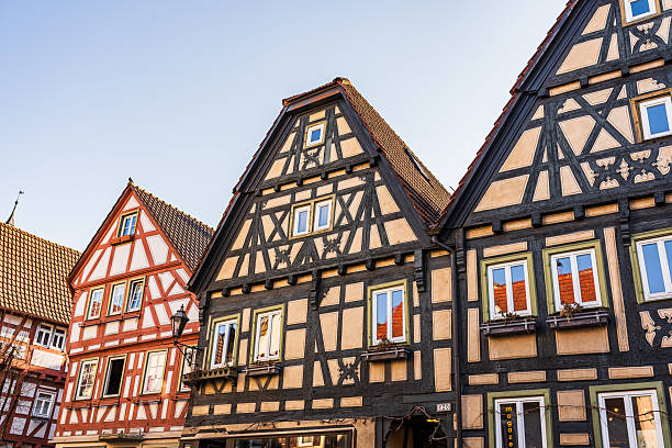 Traditional half-timbered houses in the old town of Besigheim, a picturesque city in southern Germany. These colorful Fachwerk buildings showcase the charming medieval architecture typical of the region, attracting many visitors and tourists.