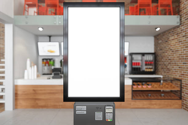 istock Front View Of Self Service Kiosk With Blank Screen In Fast Food Restaurant 2210682018