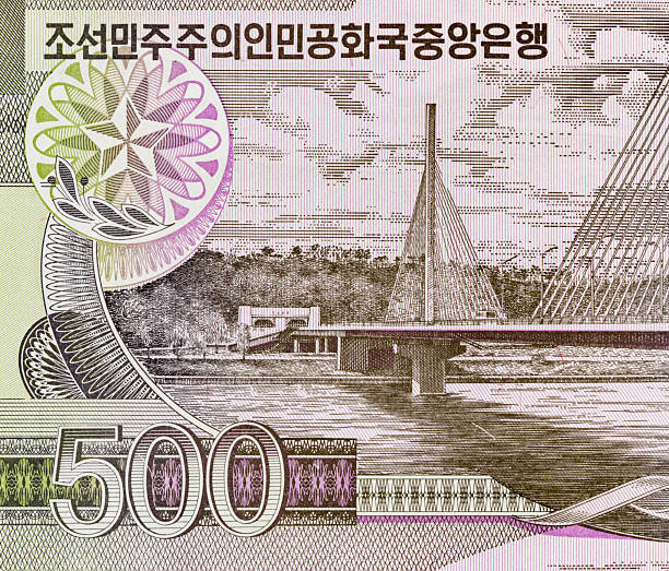 istock 500 Won North Korea banknote with the image of Chongryu Bridge over Taedong River, Pyongyang. North Korean paper money. 2210684629