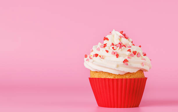istock Festive cupcake topped with swirled frosting 2210684899